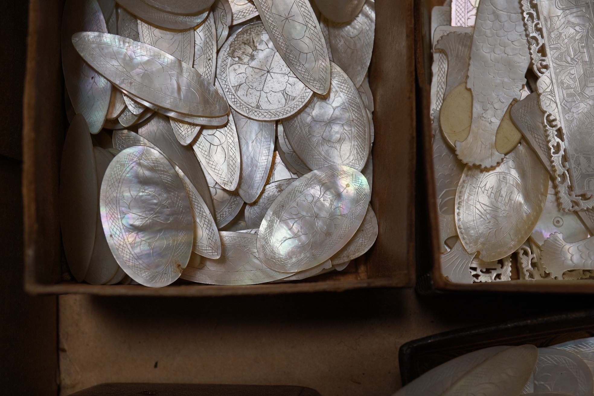 A group of 19th century Chinese mother of pearl gaming counters and accessories, together with a miniature silver cased compass